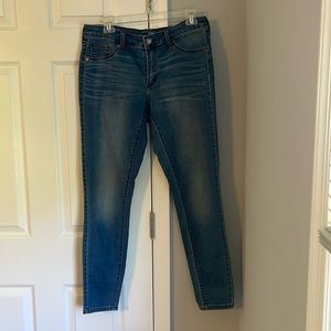 Universal thread medium wash jeans.